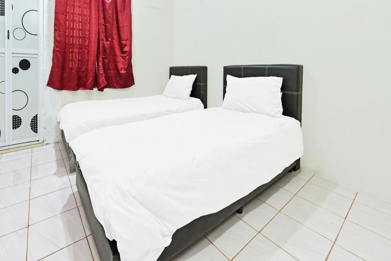 Oyo 90596 Casaria Inn Paka Kültér fotó