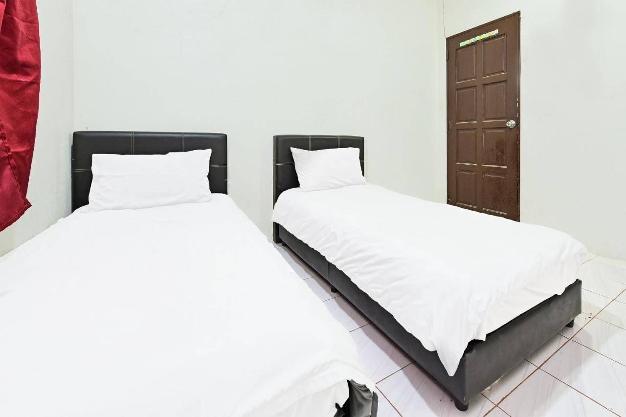 Oyo 90596 Casaria Inn Paka Kültér fotó
